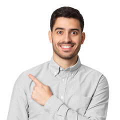 Fototapeta premium Young man in grey casual shirt smiling and pointing sideways with arm crossed, no glasses