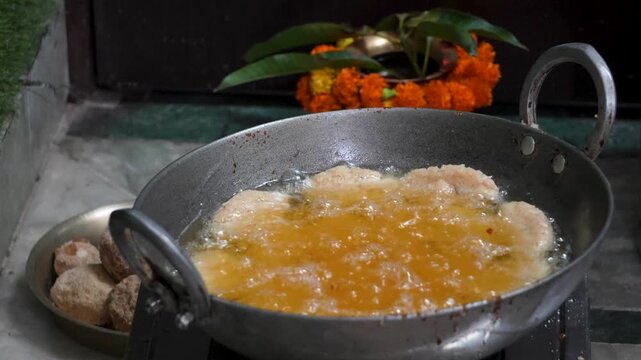 Traditional Thekua Being Fried in Oil for Chhath Puja Prasad