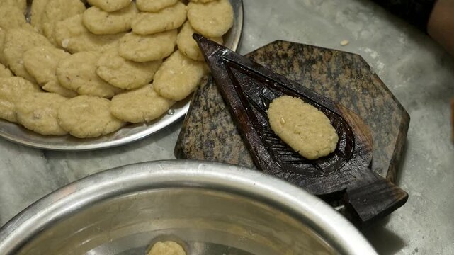Traditional Thekua Being Fried in Oil for Chhath Puja Prasad