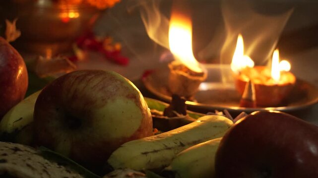 Sacred Diya Flame in Front of Hindu Deities During Worship, Chhath pooja Kharna pooja