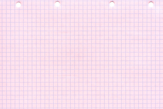 Pastel pink graph paper with perforations for school and office use.