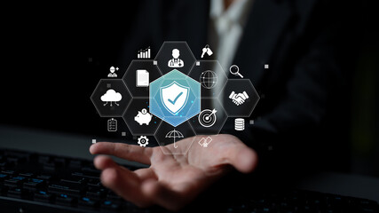 Naklejka premium Digital Security Concept with Shield Icon and Various Technology Symbols for Cyber Protection and Data Privacy Solutions Quark.