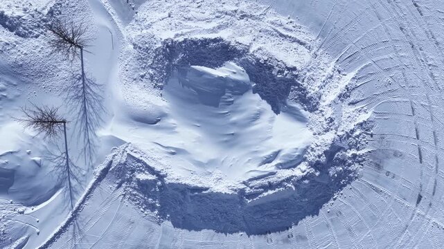 Winter Snow piled up in parking lot after extreme cold freeze from winter blizzard storm in Central New York State

