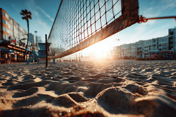 Beach volleyball on sandy court at sunset &ndash; summer sport and outdoor lifestyle