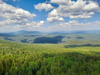 Obraz premium Blue sky over the mountains. Forest, mountains, sky