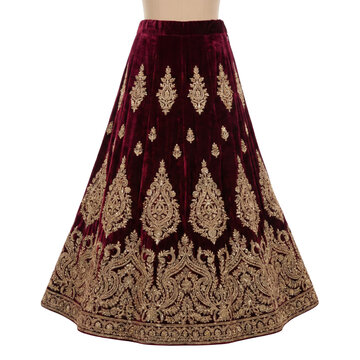 Burgundy velvet lehenga skirt with heavy gold embroidery