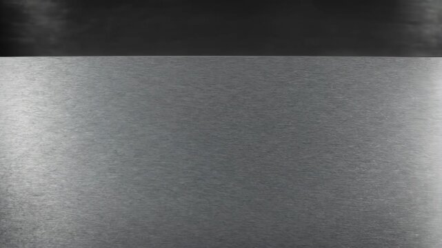 Brushed Metal Texture Video Preview with Metallic Gradient Reflections Across Surfaces.