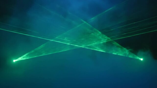 Dynamic Green Laser Beams Through Night Fog Scene.