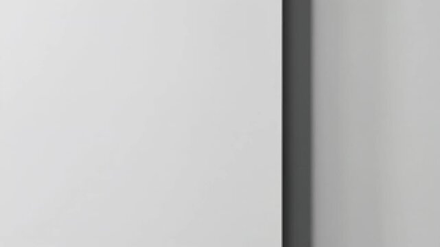 Minimal monochrome architectural wall with subtle vertical shadow.