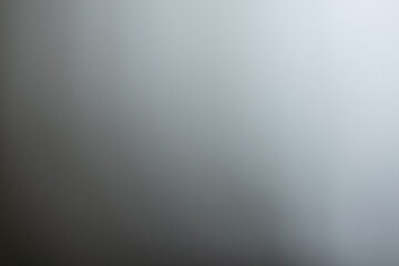 A vibrant, abstract blurry background with soft gray tones, perfect for adding a touch of color and texture to a variety of creative and business projects.