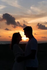 Fototapeta premium silhouette of a couple at sunset