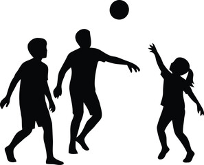 Three children playing volleyball in silhouette