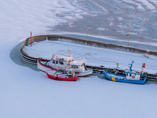 fishing boats moored in winter