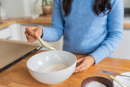 Close-Up Of Mixing Flour And Sugar