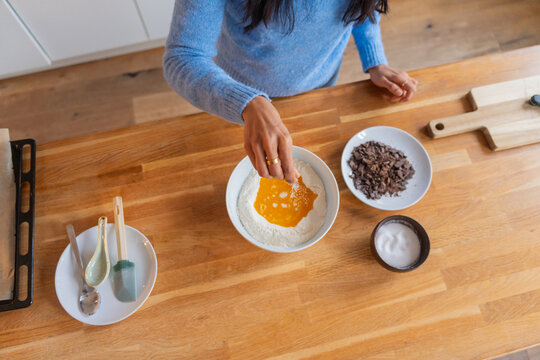 Adding Ingredients To Baking Mixture

