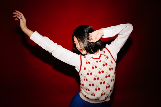 Modern model dancing in artificial light