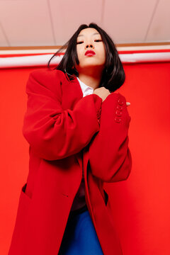 Ethnic woman in red clothes