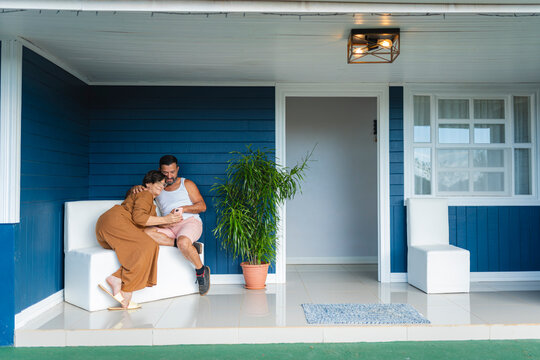 Couple sharing a moment on the porch