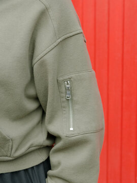Sleeve and zipper pocket