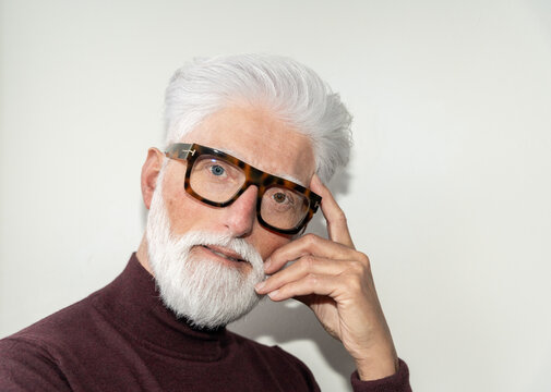 Bright Portrait Of Senior Man With Glasses

