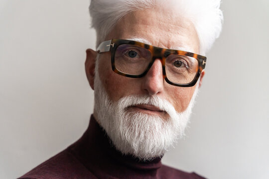 Elegant Portrait Of Senior Man With Glasses