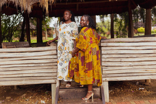 Two black women stood in a cabin entrance