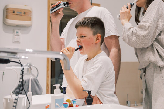 Family morning routine in bathroom