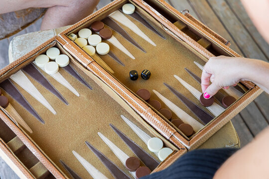 Exciting Backgammon Game in Progress Outdoors
