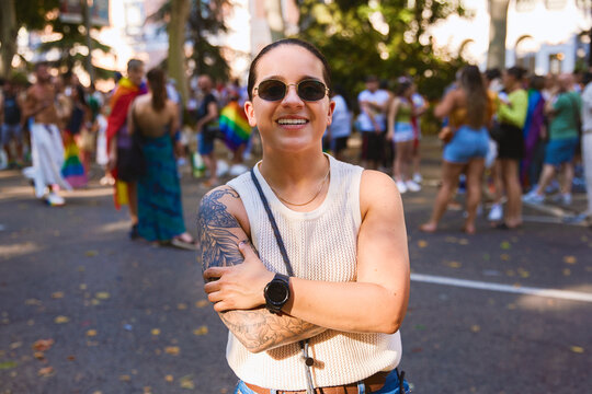 Confident woman smiling at the Pride parade
