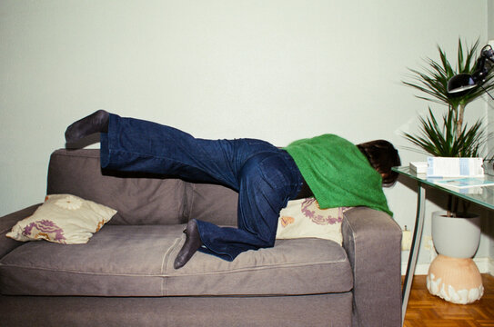 Jumping over the sofa to reach the electric socket