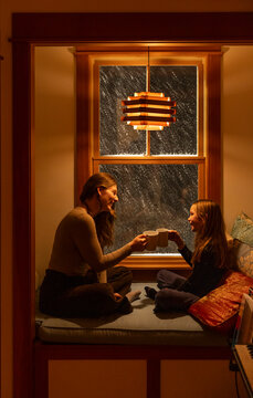 Family Portrait together cozy hygge house during snow storm 