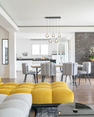 Modern open-plan living room and dining area in bright contemporary home