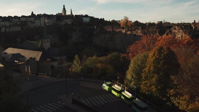 A street in Luxembourg along the medieval city wall with the Ville-Hout district in the background