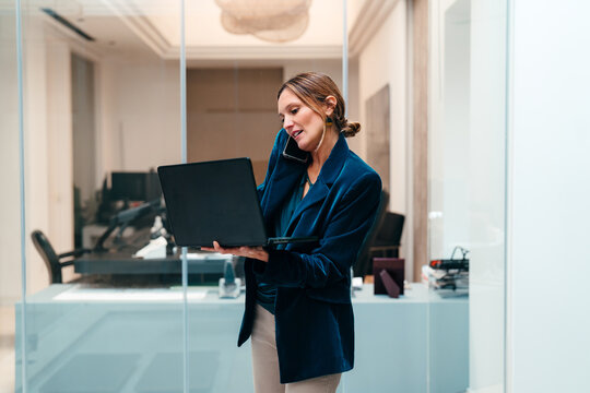 Busy businesswoman multitasking at work