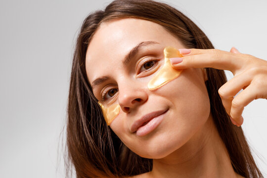 Skincare Woman with Gold Under-Eye Patch