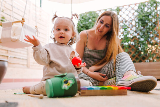 Toddler playing with toys