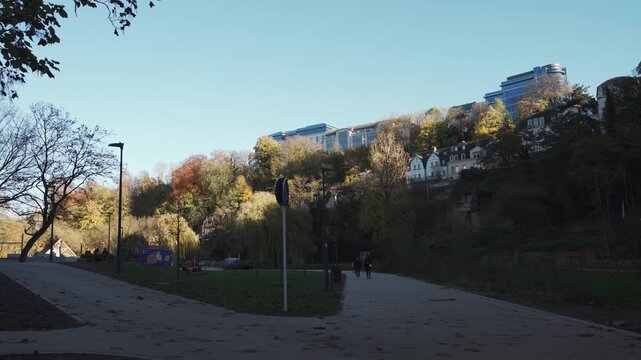A street in Luxembourg along the medieval city wall with the Ville-Hout district in the background