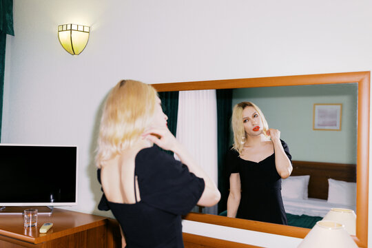 Beautiful  Person with blond hair indoors