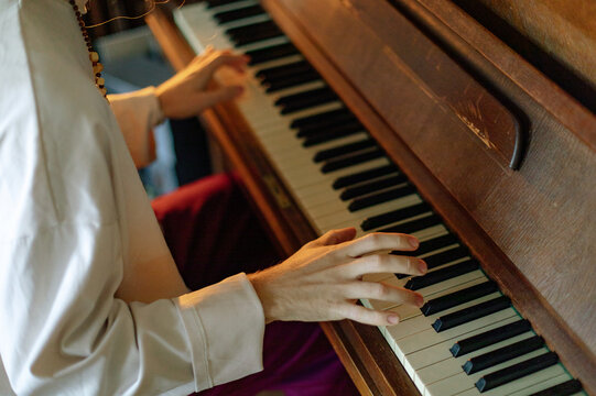 
pianist's hand on the keys
