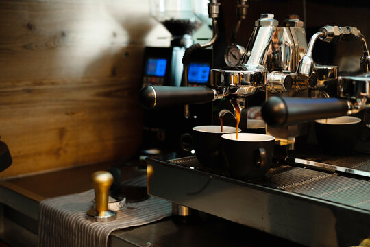 Coffee machine making coffee in cafe
