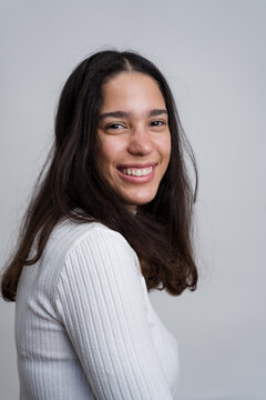 woman smiling and showing happiness