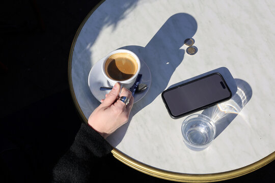 Coffee Break at Outdoor Cafe Table