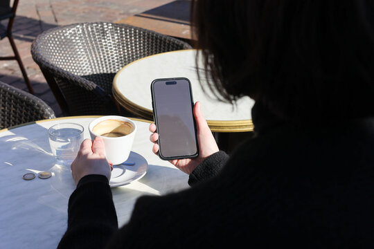 Woman enjoying Coffee in sunny day 