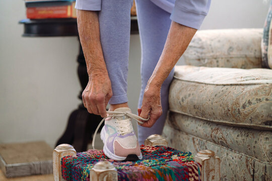 Senior Woman Tying Shoelaces 