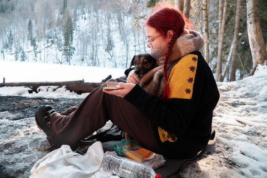 Eating on picnic with dog