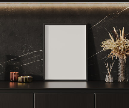 Empty poster or picture frame mock-up in luxurious dark interior