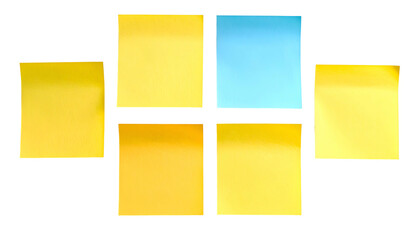 Fototapeta premium A cluster of rectangular sticky notes, mostly yellow with one blue, against a black background