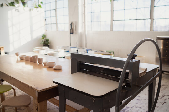 Pottery studio with slab roller machine  
