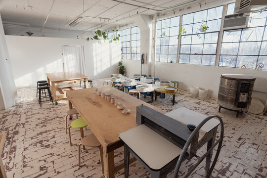 Bright Industrial Pottery Studio with Equipment  
