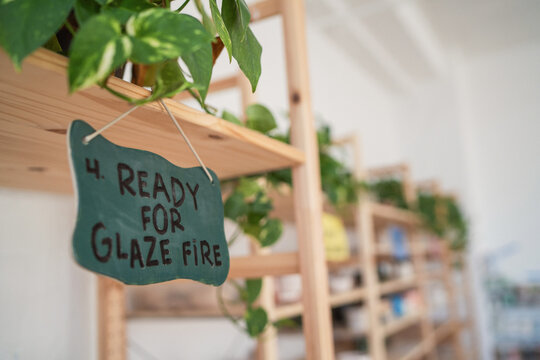 Sign indicating pottery ready for glaze firing  

